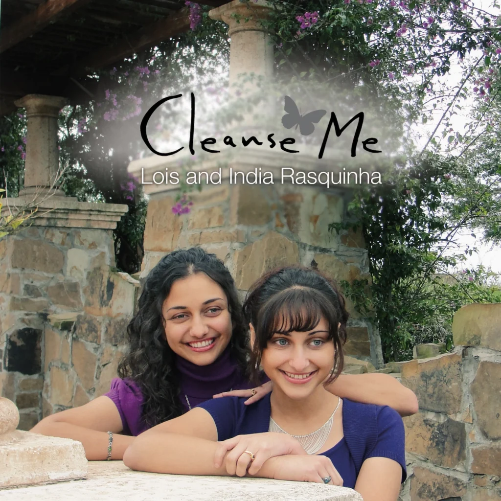 Album Cover for "Cleanse Me". It features Lois and India with stone structures in the background