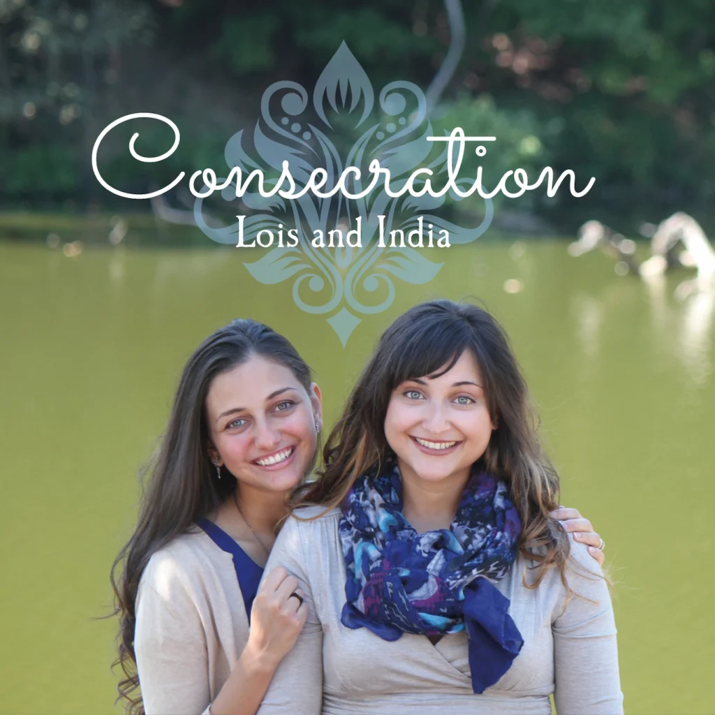 Album cover for "Consecration". Features Lois and India facing the camera with green grass behind them.