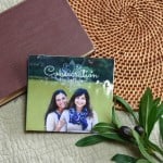 CD of "Consecration". The music is surrounded by a bible and a small leafy plant.