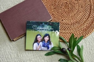 CD of "Consecration". The music is surrounded by a bible and a small leafy plant.